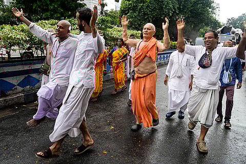 Devotees dance during Ratha Yatra